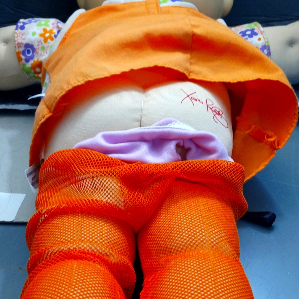 Cabbage Patch Kid with Teeth.